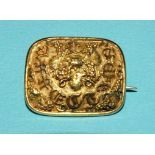 An early-19th century rectangular gold mourning brooch with raised letters "AFFECTION" around grapes