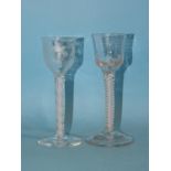 Two 19th century ale glasses with air-twist stems, one engraved with fruits and vines, 15cm high, (