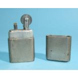 The "Howitt" silver cigarette lighter by Dudley Russell Howitt, with overall engine-turned