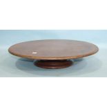 A 19th century mahogany revolving circular serving tray, 68cm diameter, 13cm high.