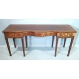 An Adams-style mahogany serpentine serving table of long narrow form, the top with beaded borders