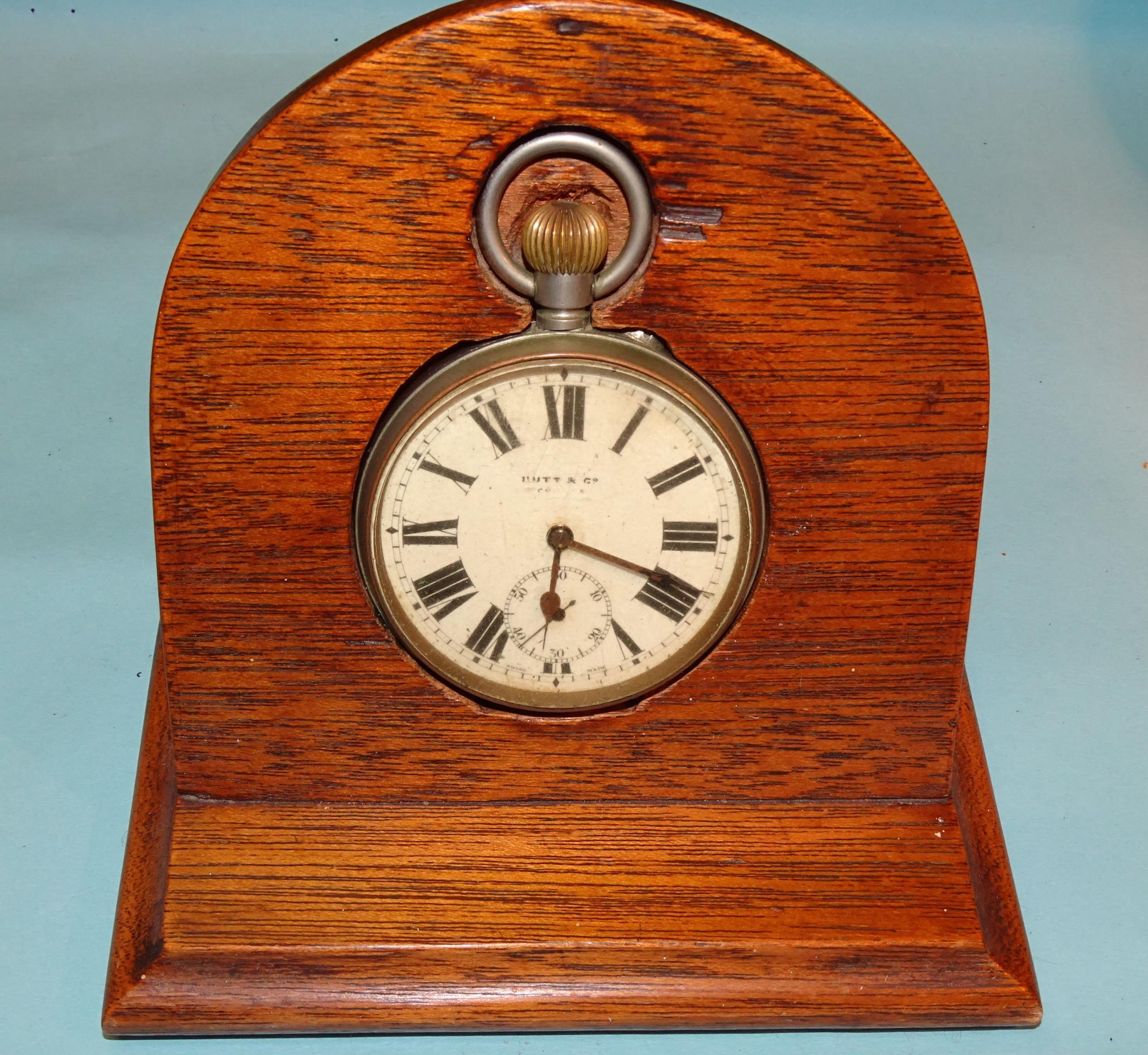 A large open-face keyless pocket watch, the white enamel dial with Roman numerals and seconds