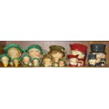 A collection of Royal Doulton character jugs, comprising 'Arriet' (large, small, miniature and