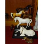 A collection of Beswick horse ornaments, including 'Spirit of Youth' on plinth, 'Spirit of Peace' on