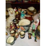 A collection of Royal Doulton character jugs, miniature Dickensian condiments and other ceramics.
