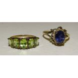 A 9ct gold ring set five oval peridots, size L½ and another ring set amethyst, size N, 3.9g, (2).