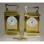 Woodford, a modern brass-cased English carriage clock, the circular dial set with Roman numerals,