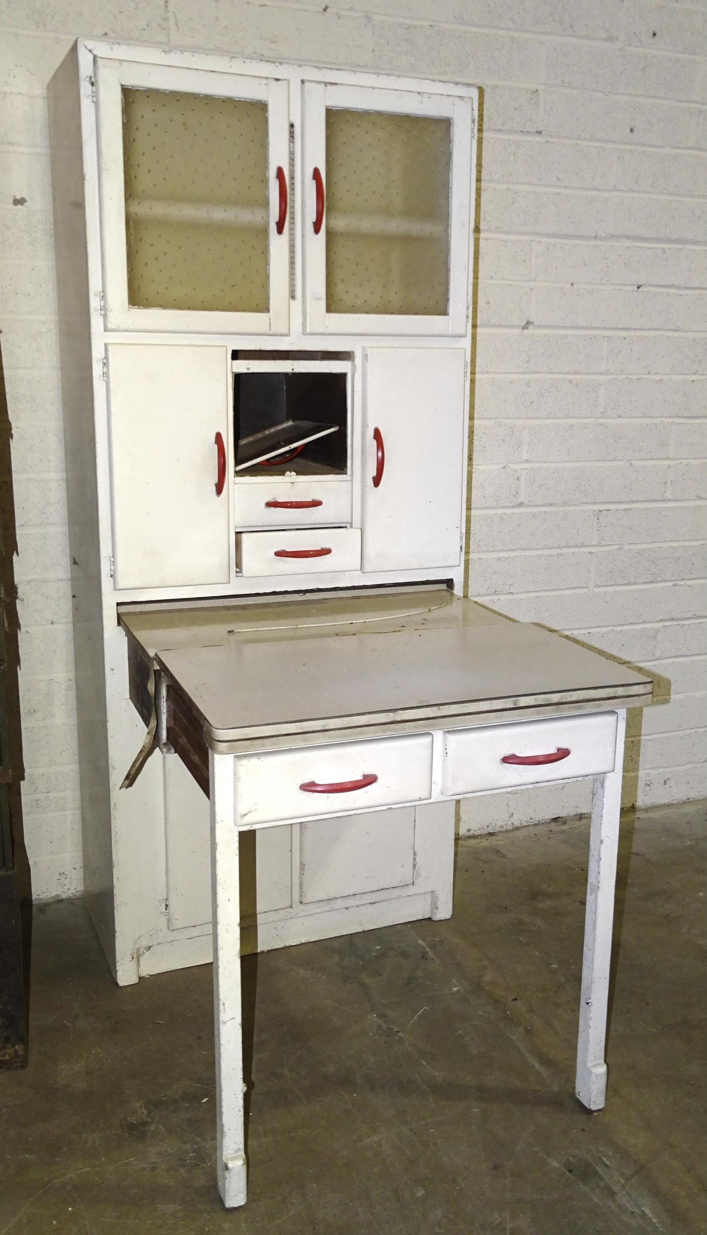 A 1950's painted kitchen cabinet with pull-out work surface.
