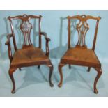 A set of six reproduction mahogany Chippendale-style dining chairs with drop-in seats, on cabriole