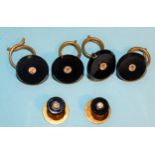 An Art Deco onyx and diamond dress stud part set, comprising: four buttons and two studs,