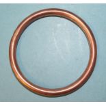 A 9ct rose gold slave bangle, inner diameter 7cm, 17.2g, (some dents).