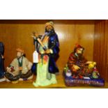 Three Royal Doulton figurines: 'Omar Khayyam' HN2247, 'Blue Beard' HN2105 and 'The Potter'
