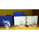 Swarovski, four crystal glass figures: 'Blue Tang Fish', 'Chimpanzee', 'Kris Bear - Celebration' and