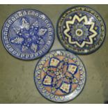 Two polychrome Middle Eastern Safi hand-painted dishes of geometric designs, 41cm and 42cm