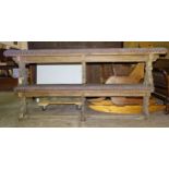 A pair of oak chapel benches with upholstered seats, 164cm long.