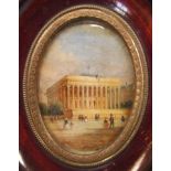 A 19th century oval painted miniature on glass depicting a colonnaded building flying the French