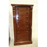 A similar mahogany Wellington chest, with key, 51 x 104cm.