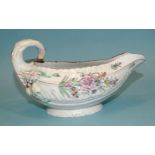 A Worcester 'cos lettuce' moulded sauce boat with famille-rosed decoration, 10cm high, 18.5cm long.