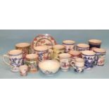 A large group of thirteen 18th century Chinese export tankards in blue and white, famille rose and