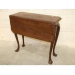 A narrow mahogany drop-leaf table, the single drop leaf on octagonal tapered shaped legs, 77.5cm