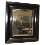 An antique ebony-veneered wall mirror, the concave shaped frame with bevelled plate, 57 x 50cm.