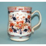 Chinese 18th century, an Imari baluster tankard, 15cm high, (hairline crack to base of handle).