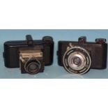 A Nova sub-miniature camera, (no exposure plate on back) and a Tex sub-miniature camera with