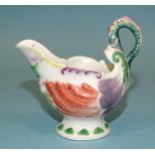 A Derby? dolphin moulded cream boat with lamprey handle, 8cm high.
