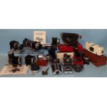 A quantity of camera accessories, including three Novoflex focus bellows, Pro-flex bellows, one