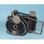 A Bobby/Aiglon 16mm sub-miniature camera with black cast-metal body, time and instantaneous