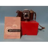 A Zeiss Ikon Contaflex II, with leather case, instructions and original box.