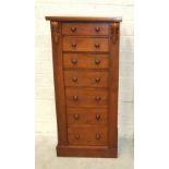 A Victorian walnut Wellington chest of seven graduated drawers, with key, 48 x 102cm.