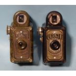 A Coronet Midget green Bakelite camera, (small chip to back corner) and a black Coronet Midget, (