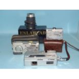Three Mamiya-16 sub-miniature cameras and an Enlahead enlarger, (boxed), (4).