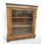A Victorian inlaid walnut display cabinet with single glazed door, on turned feet, 91 x 105cm.