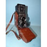 A wide-angle Rolleiflex TLR camera, serial no.W2490465, with Carl Zeiss Distagon f4 55mm lens,