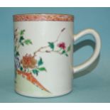 Chinese 18th century, a large famille rose mug, 14cm high, (rim chip).