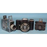 An Eljy Lumiere sub-miniature camera, a Universal Minute 16 sub-miniature camera and one other, (