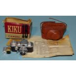 A Kiku 16 sub-miniature camera, in leather case, with two films, instructions and original cardboard