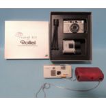 Rollei, a boxed travel kit of compact Nano 80 camera, Albin AR binoculars and tripod and a Rollei