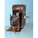 The Houghton-Butcher MFG Co. Ltd No.12 Ensign Carbine Tropical folding camera, with mahogany and