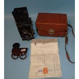 A Rolleiflex Baby 4x4 TLR camera 1933, Type 1, serial no.154343, with filters, in leather case, with