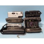A Fujica Mini sub-miniature camera, (light meter responsive), two Minolta 16QT cameras and a Yashica