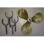 A small bronze boat-propeller, 12 x 10", two pairs of wooden oars and two pairs of rowlocks.