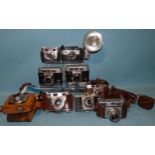 Nine various Kodak SLR cameras: Retina IIIS, Retinette IIB, Signet (x3), Colour Snap (x2),