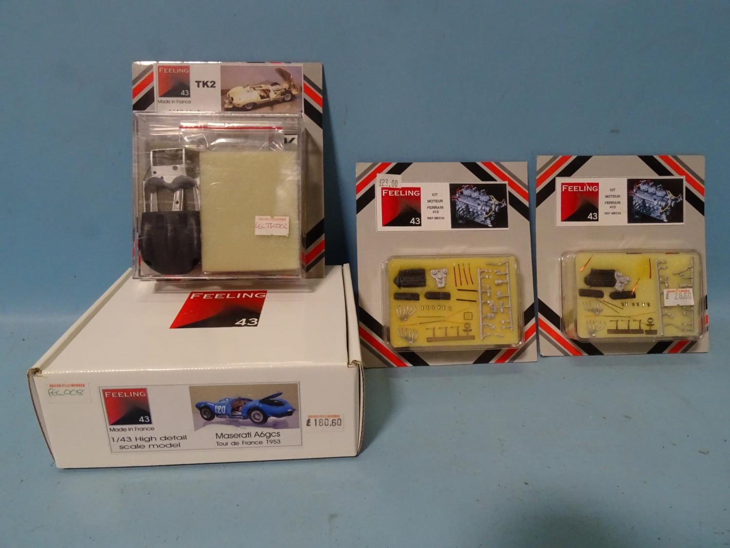 Two Feeling 43 1/43 scale white metal and resin car kits: Maserati A6gcs and Jaguar Type D and two