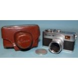 A Ricoh 16 sub-miniature camera, with Riken Ricoh f2.8 2.5cm lens, in leather case, (shutter