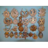 A collection of Twenty-five various Scottish, Welsh and Irish regiment military badges, including