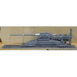 A kit built 1/30 scale model of the WWII Schwerer Gustav rail gun, 80 cm, on rails. The original