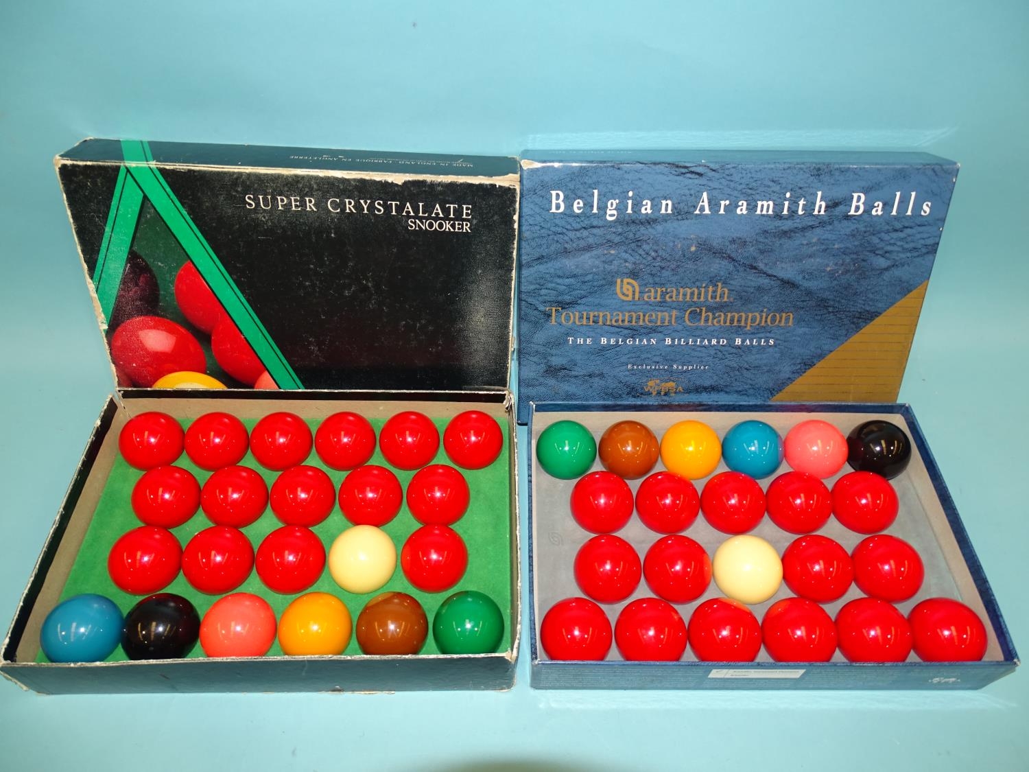 A boxed set of Belgian Aramith Tournament Champion Snooker Balls and a boxed set of Super Crystalate
